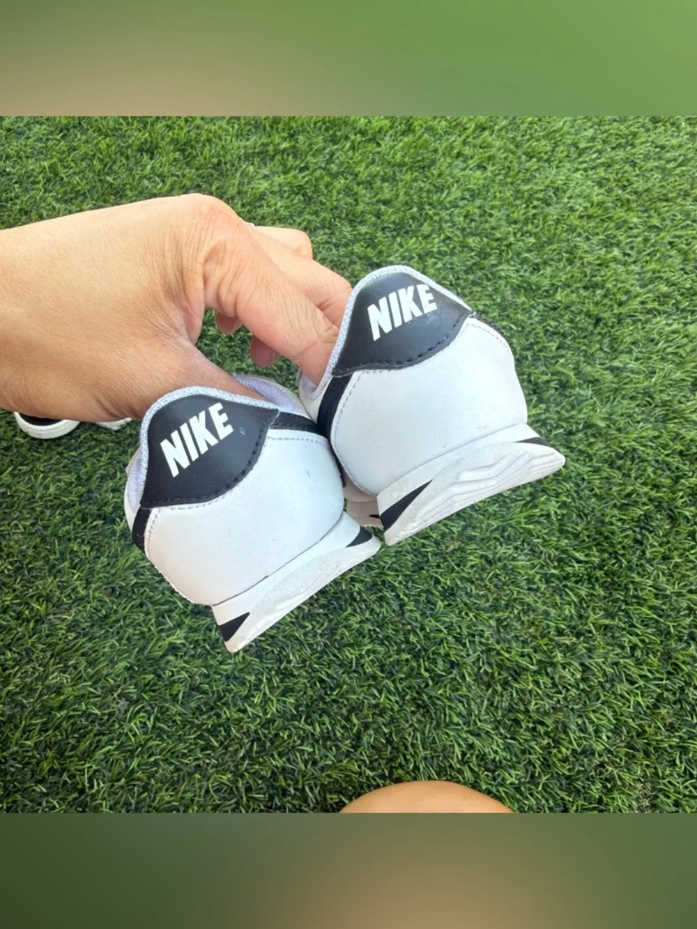 Nike Kids White Sneakers with Black Swoosh and Velcro